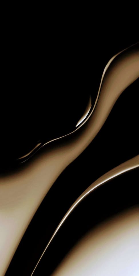 Fluid bronze form drifting through black space